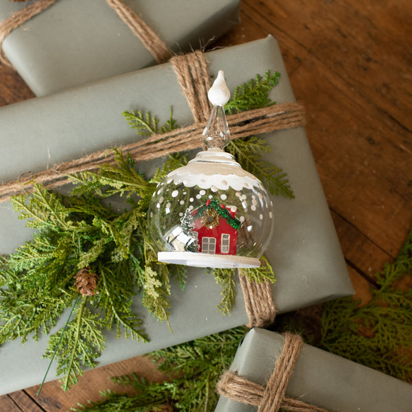 LIGHTED RED HOUSE IN GLOBE ORNAMENT