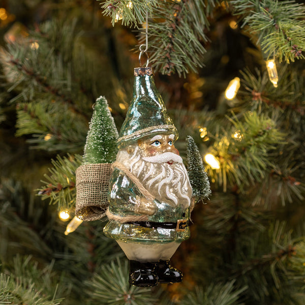 BLUE SANTA W/ TREES ORNAMENT